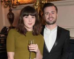 Alexandra Roach consuming alcohol
